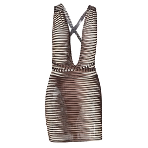 Detail of cross back straps and deep V-neckline on brown wave patterned bodycon dress