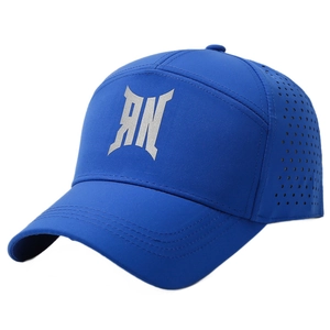 Royal blue baseball cap with laser-cut ventilation holes and silver geometric logo