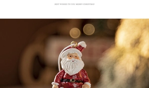 Macro shot of Santa Claus resin pendant ornament with gold hanging ring for Christmas tree