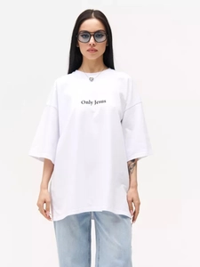 Close-up of Only Jesus letter print on white oversized cotton t-shirt for summer
