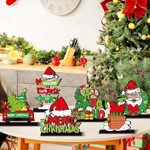 Set of six wooden Christmas desktop ornaments featuring Santa and reindeer on a festive table