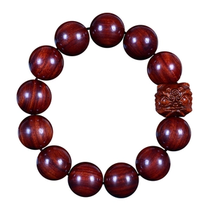 Deep red Sandalwood PiXiu bracelet with polished wooden beads and natural wood grain