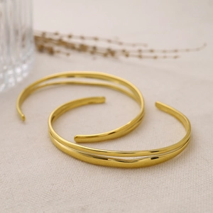 Minimalist 18K gold plated dot cuff bracelet with adjustable open design and polished finish