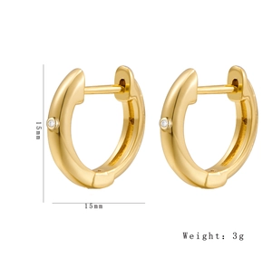Detail view of 15mm 18K gold huggie earrings with round zircon and dimension specs