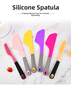 Detail of colorful silicone spatulas with ergonomic non-slip handles for baking needs