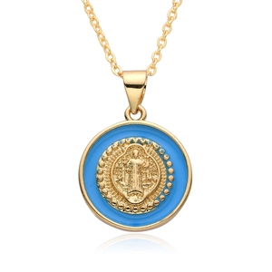 Close-up of golden Virgin Mary pendant with blue enamel border on a necklace