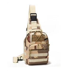 Macro detail of desert camo tactical chest bag showing MOLLE webbing and buckles