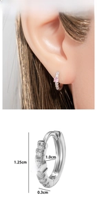 Detailed view of pink zircon hoop earring with size metrics and model wear display