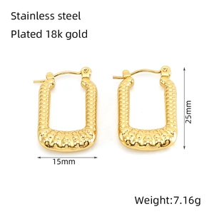 Detail of 18K gold plated stainless steel rectangular hoop earrings with beaded texture