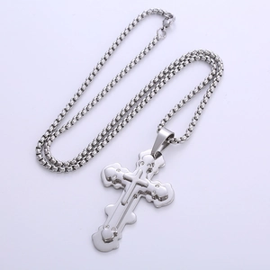 Polished silver stainless steel layered cross pendant necklace on box chain