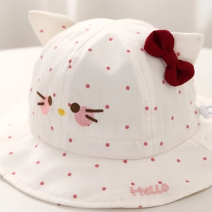 White baby sun hat with red polka dots featuring cute cat ears and a red bow decoration