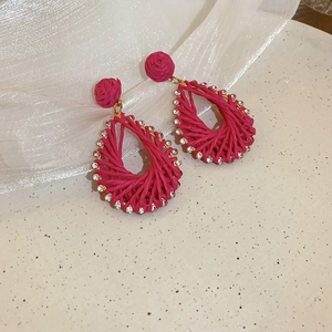 Handmade magenta woven teardrop earrings with sparkling rhinestones for beach vacations