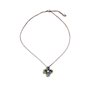 Elegant silver necklace with clover pendant featuring blue and green zircon stones