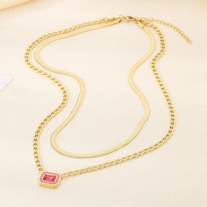 Double-layer gold Cuban and snake chain necklace with a pink gemstone rectangle pendant
