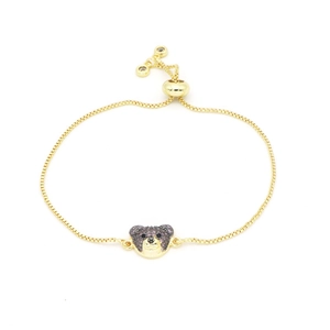 Detailed view of adjustable gold box chain bracelet with micro-paved zircon bear charm