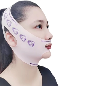 Pink V-line lifting mask with purple pattern for chin contouring and skin tightening