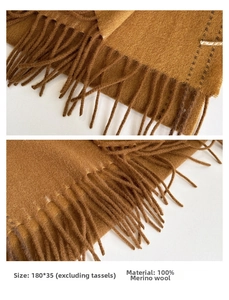 Detail of camel wool scarf showing fringe edges and 100% pure sheep wool texture