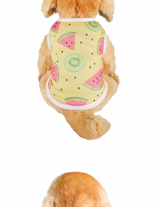 Close-up of yellow dog vest featuring watermelon fruit print and breathable mesh fabric