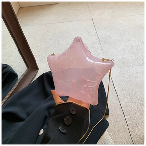 Pink transparent star-shaped acrylic handbag with gold metal chain and jelly texture