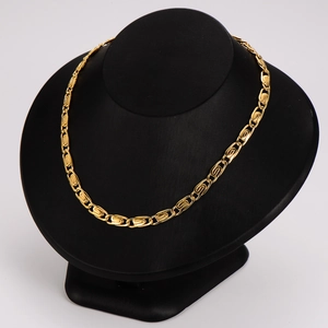 Elegant gold paperclip chain necklace for women displayed on a black neck bust model