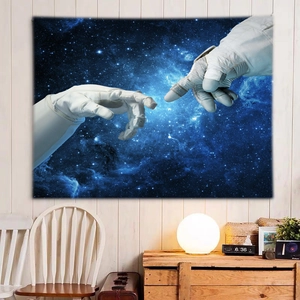 Close-up of starry sky tapestry with astronaut design hung on a light wooden wall