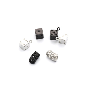 DIY jewelry kit with silver and black dice beads plus cylindrical hollow dragon spacers