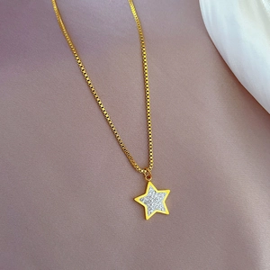Titanium steel box chain necklace featuring a gold star pendant with micro-inlaid stones