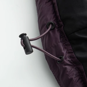 Deep purple quilted winter jacket with adjustable elastic drawstring and black buckle