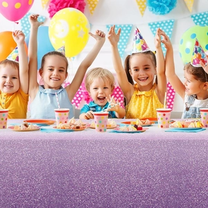 Close-up of sparkling purple gradient tablecloth with shiny dots for girls birthday party decor