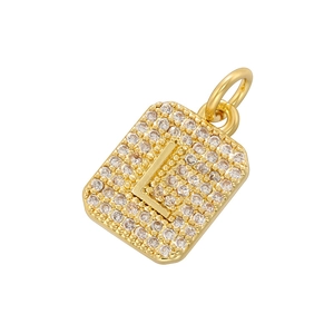 Macro shot of gold square letter L pendant with micro-pave cubic zirconia crystals