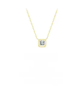 Detail of S925 silver necklace with gold square claw-set pendant and clear stone