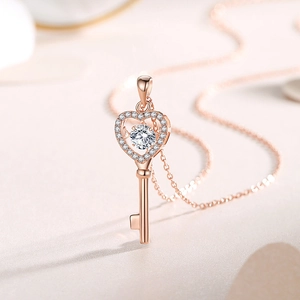 Elegant rose gold S925 sterling silver heart key necklace with sparkling moissanite stone