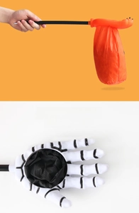Skeleton hand candy grabber bags for Halloween trick or treat in orange and white colors