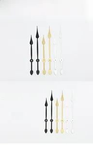 Detailed set of minimalist aluminum clock hands in matte black, bright gold and white