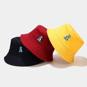 Set of colorful bucket hats with cute blue cartoon dinosaur embroidery for outdoors