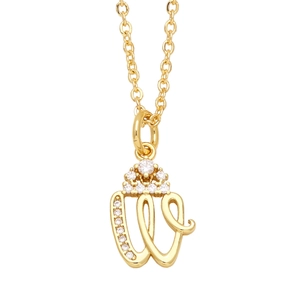 Detailed shot of gold-plated W letter pendant with crown and shimmering zircons