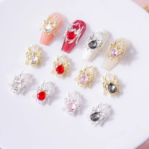 3D spider nail art charms with teardrop rhinestones in gold and silver metal finishes