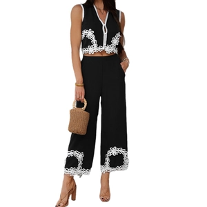 Ensemble bohème noir pour femme avec broderie florale blanche et pantalon large