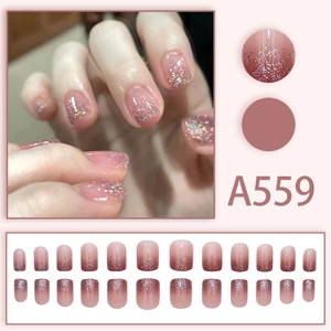 Faux ongles dégradés roses avec paillettes argentées et design carré court A559