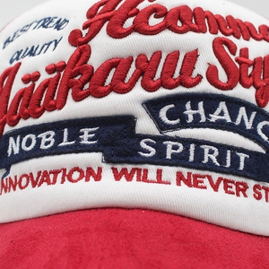 Close-up of 3D embroidery and Noble Spirit patch on the vintage mesh baseball cap