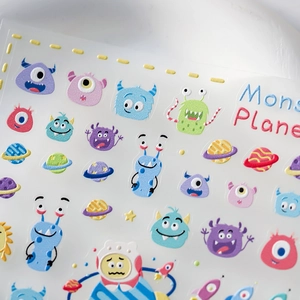 Space monster theme embossed nail stickers with cartoon astronauts and colorful planets