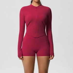 Deep red two-piece sports set featuring a zipper jacket and high-waist fitness shorts