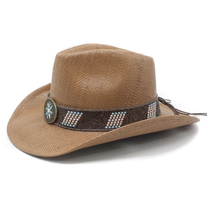 Detail of woven straw cowboy hat with embossed leather band and ethnic beaded accents