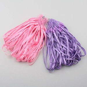 Close-up of pink and purple nylon wrist lanyards with secure clips for phones