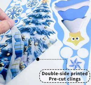 Close-up of double-side printed Christmas window clings showing pre-cut snowflake designs