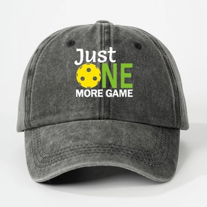 Vintage washed grey baseball cap with Just One More Game slogan and pickleball icon