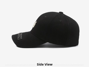 Close-up of black cotton baseball cap showing side profile and white SON embroidery