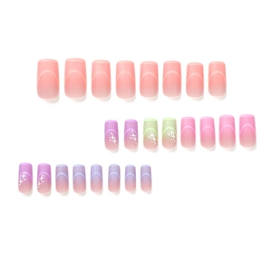 French gradient press-on nails with star patterns in pink purple and green