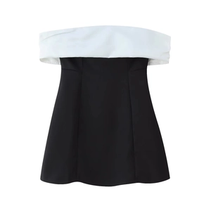 Sleeveless black and white bow contrast dress with elegant fold-over collar