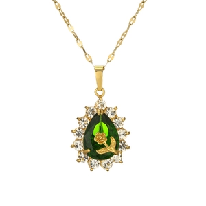 Elegant gold necklace with teardrop green gemstone pendant and 3D rose detail